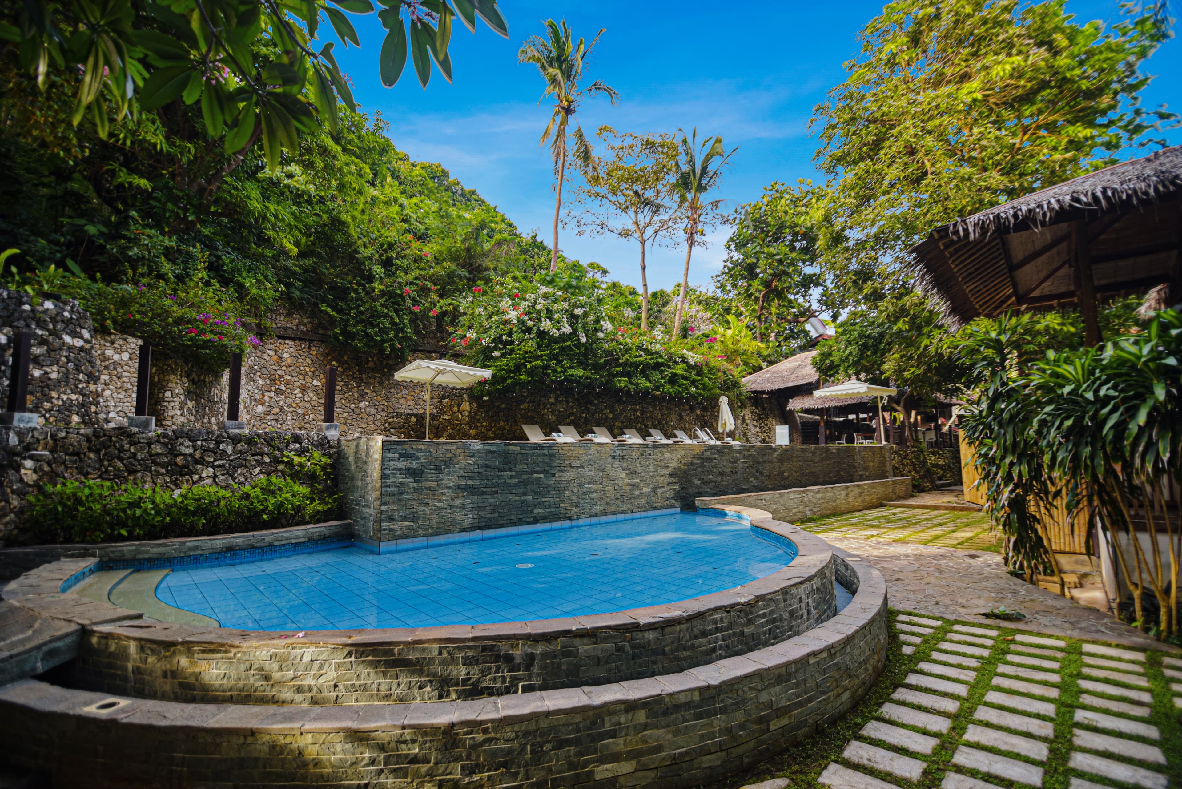 The Strand poolside - Where mahogany and island heritage meet